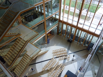 commercial timber frame atrium UBC glu-lam timbers floating stairs